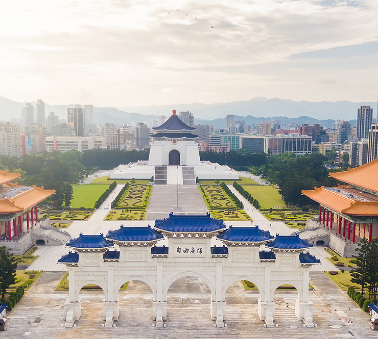 aerial sunrise view from drone of Chiang Kai-Shek Memorial Hall with taipei city