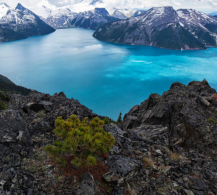 View of mountains and Garibaldi Lake from Panorama Ridge in Squamish, British Columbia, Canada.