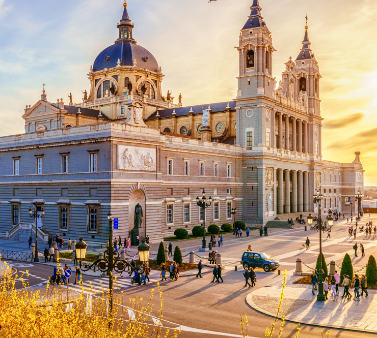 The Cathedral of Madrid and courtyard at sunset in Madrid, Spain. 