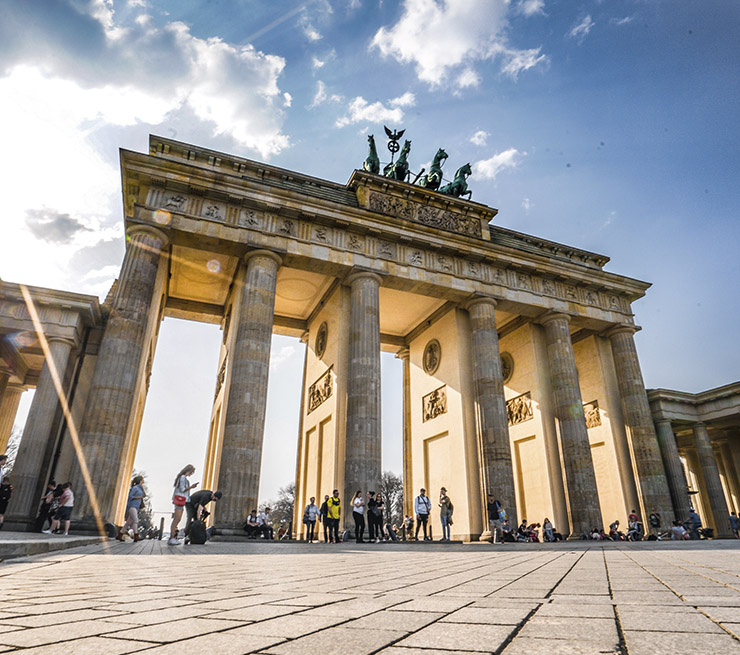 Low angle view of Brandenburg Gate on a sunny day in Berlin, Germany. 
