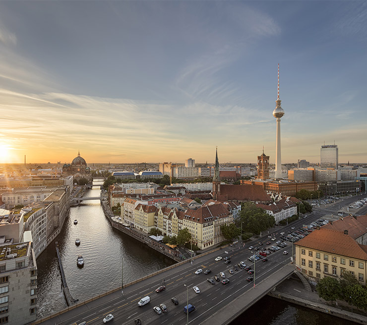 View of the Television tower, the Red Town Hall, Berlin Cathedral and Berlin skyline along the river Spree in Germany. 