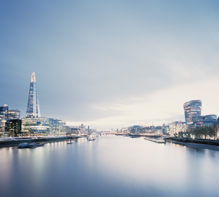City of London skyline against River Thames at dusk
