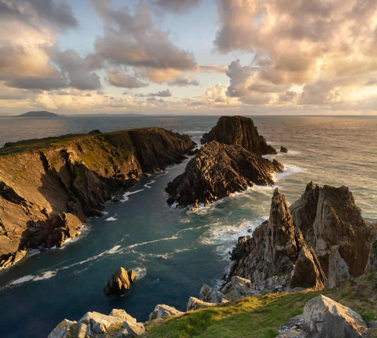 A scenic view of the Irish Sea against the sky during sunset. 