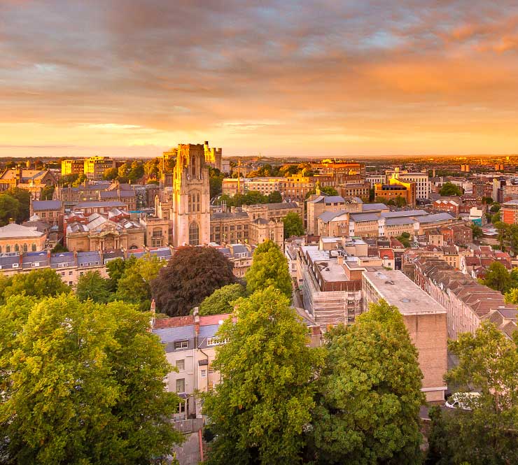 Cityscape view of University of Bristol buildings at dusk.