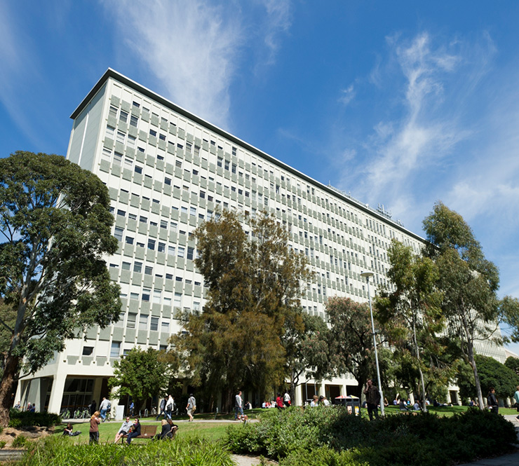 multistory building in park setting at Monash University Clayton campus