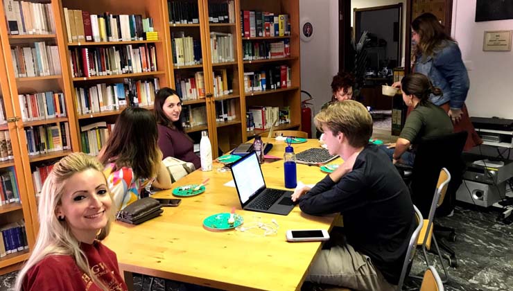 Students enjoy a meal and do work in the Bologna Study Center 