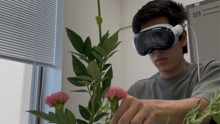 Derek practicing ikebana, the Japanese art of flower arrangement with visual app