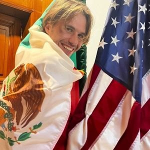 Sebastien Bridonneau wrapped in flag of Mexico