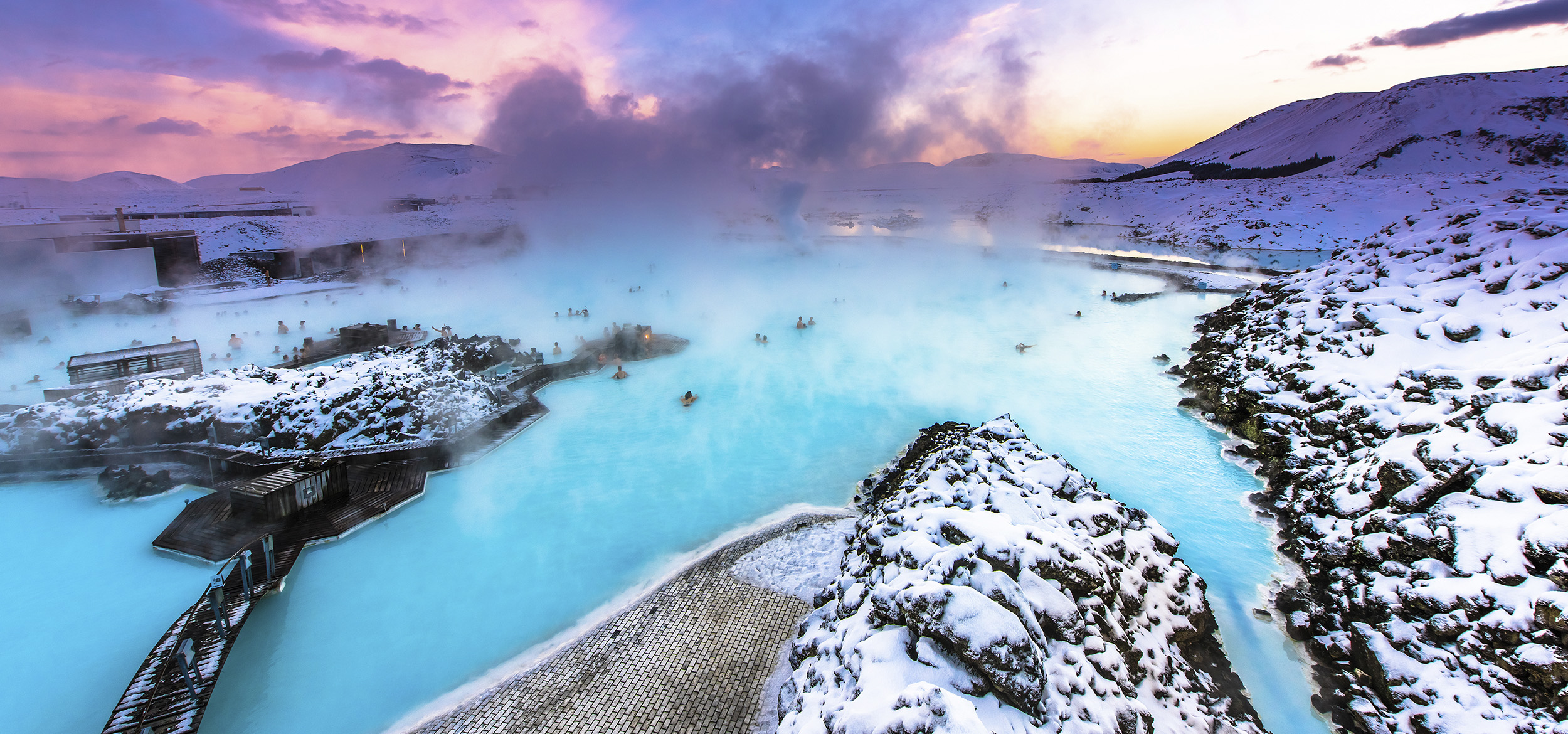 Steam rises from the Blue Lagoon hot springs in Iceland. 