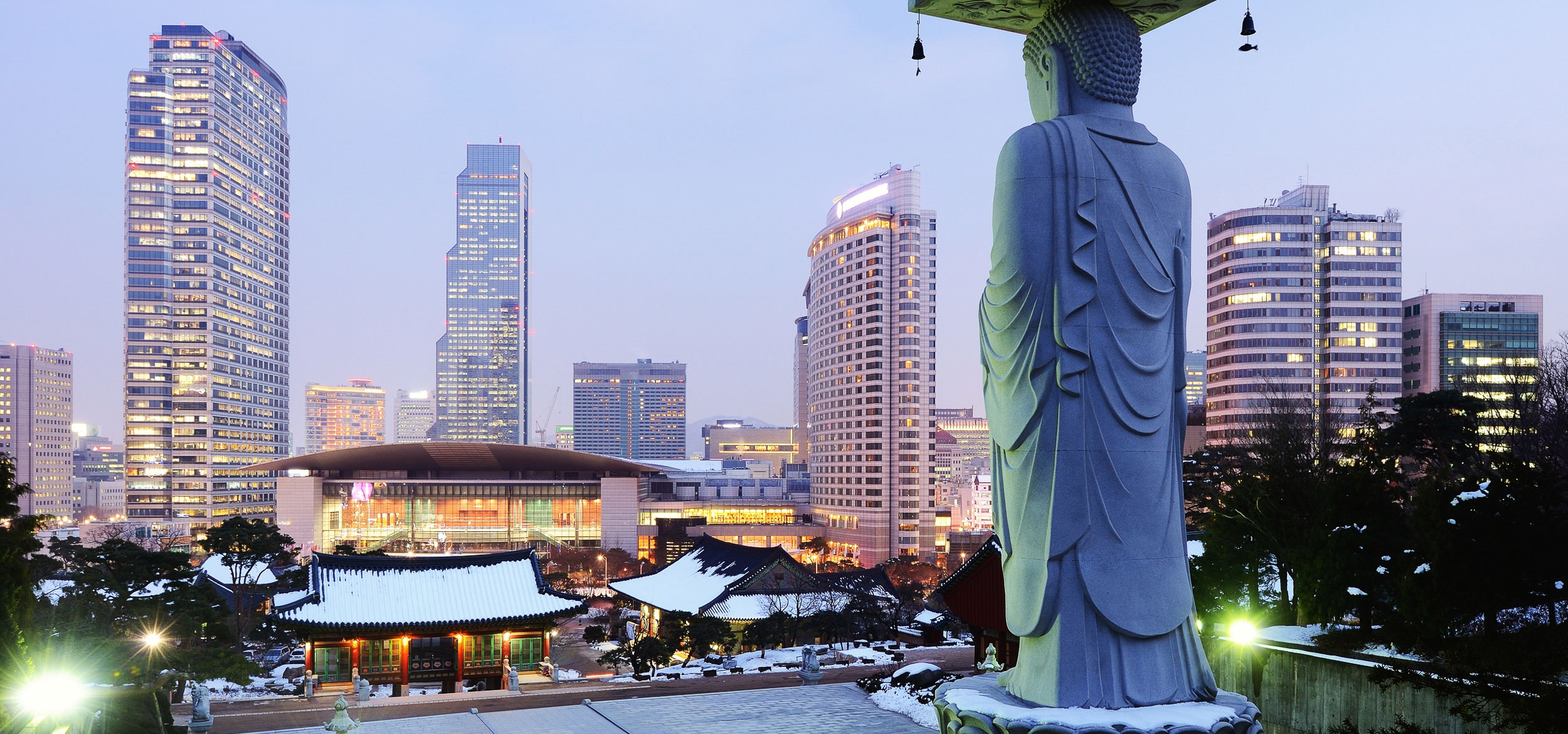 View of the Bongeunsa Temple and urban buildings in the Gangnam District of Seoul, South Korea.