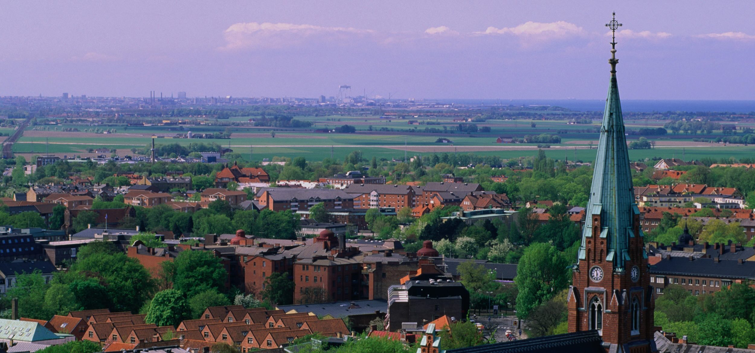 All Saints Church Spire and cityscape, Lund, Skane, Sweden.