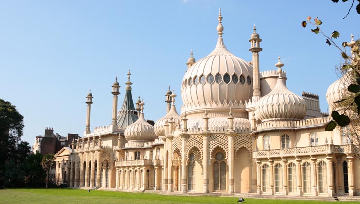 View of Royal Pavilion and grass lawn in Brighton, England. 