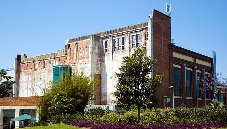 Outside view of the brick building of Brisbane Powerhouse Museum.