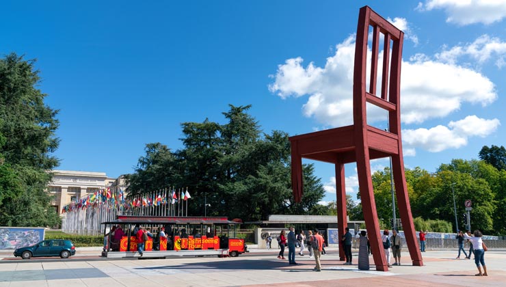 Large sculpture of a chair across the street form the Palace of Nations in Geneva, Switzerland. 