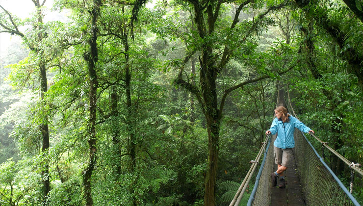 Woman on a bridge in Costa Rica. 