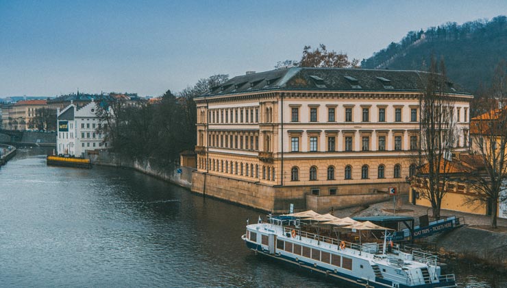 View of a boat on the Vltava River in Prague, Czech Republic. 