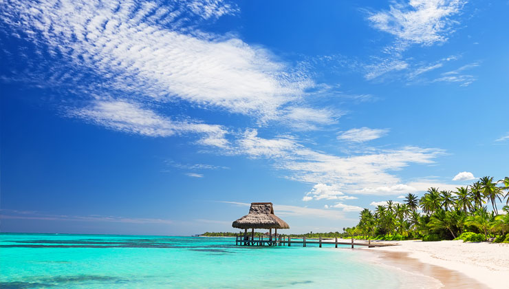 Beautiful gazebo on the tropical white sandy beach.