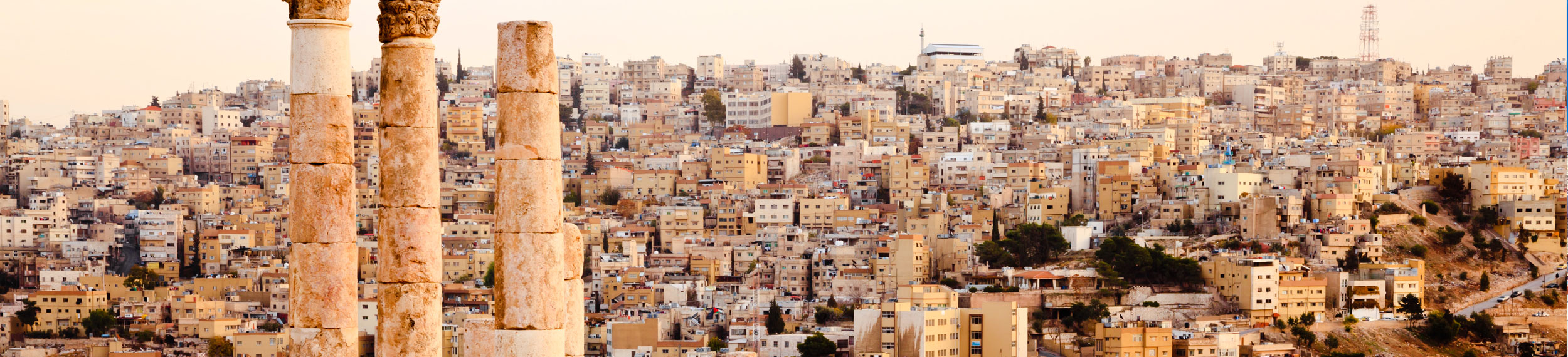 Landscape shot of Temple of Hercules with a view of the columns at the Citadel in Amman, Jordan. 