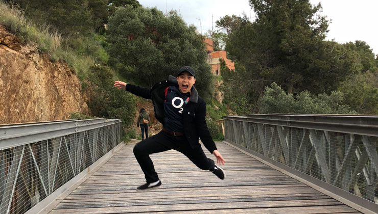 UC Irvine student jumping in Barcelona, Spain.