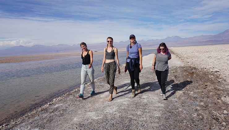 Students walk on the Salar de Atacama salt flat.