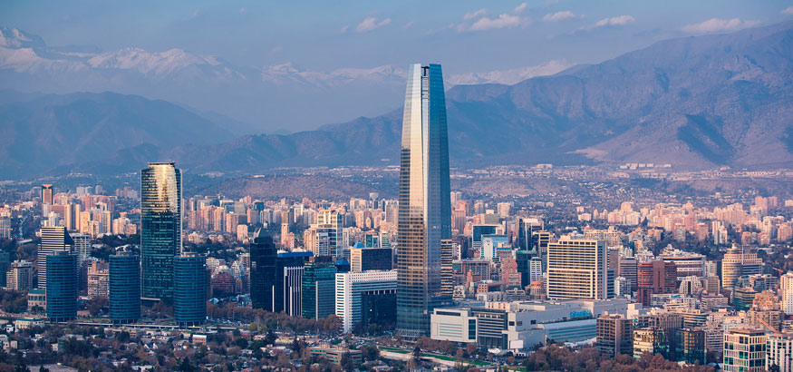 Aerial view of the financial district with mountains in the background in Santiago, Chile.