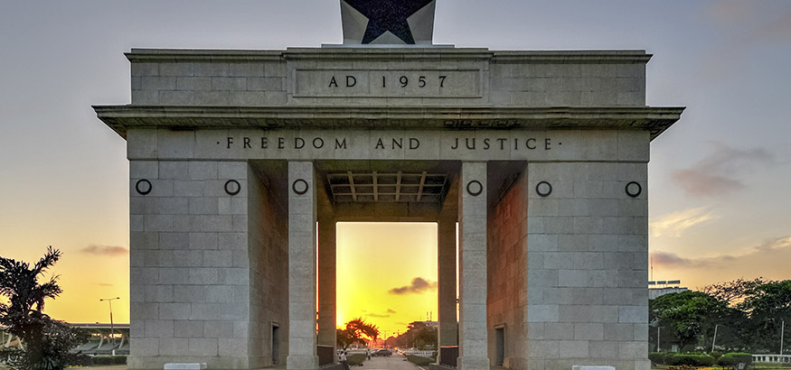 View of the Independence Arch at dusk in Accra, Ghana. 