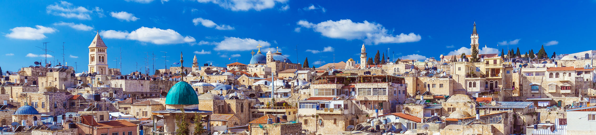 Roofs of Old City with Holy Sepulcher Church Dome in Jerusalem, Israel.