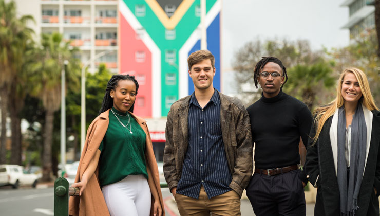 Four students posing in Cape Town, South Africa. 