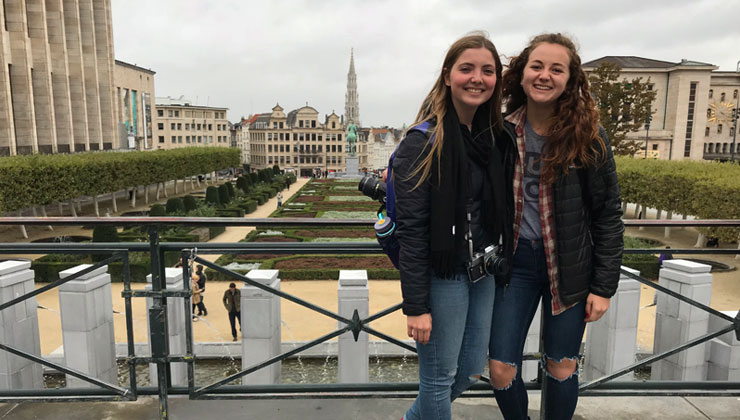 Two students standing in front of Mont des Arts in Brussels, Belgium. 