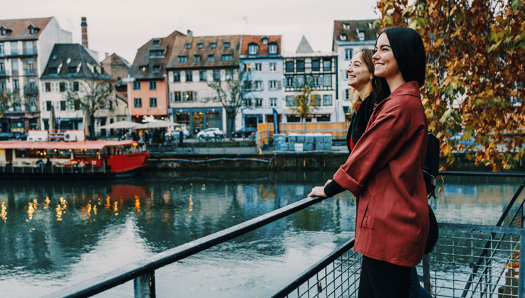 Two students looking out over the water in Strasbourg, France. 