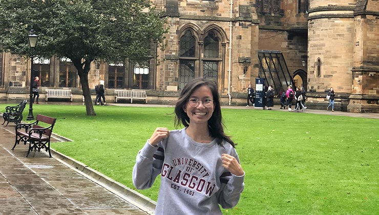 Cindy Cheung of UC Davis smiles at the camera on the University of Glasgow campus in Scotland.