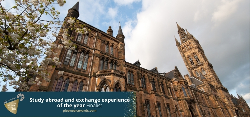 Looking up at the exterior of the main building of the University of Glasgow, Scotland. PIEoneer study award experience finalist logo on top of the image