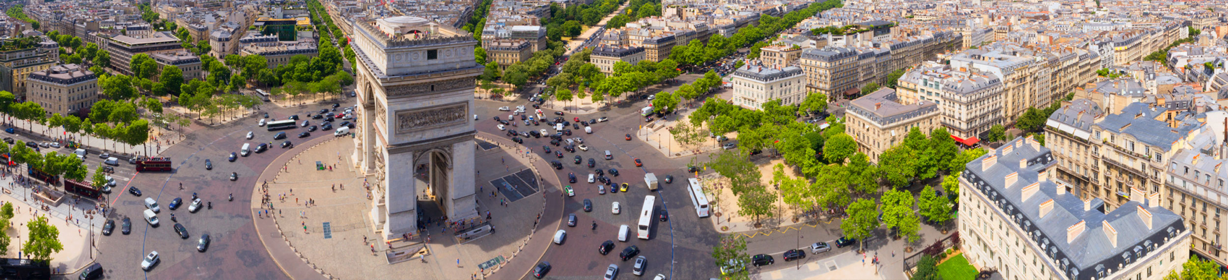 An aerial view of the Arch de Triomphe in Paris, France.