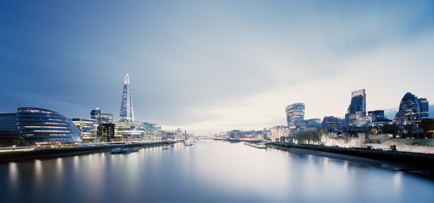 City of London skyline against River Thames at dusk