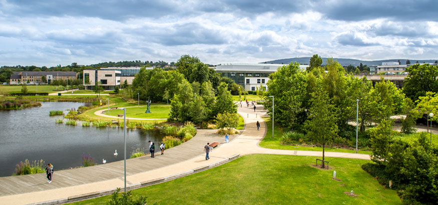 Public green space, pathways and lake on the University College Dublin campus in Dublin, Ireland.
