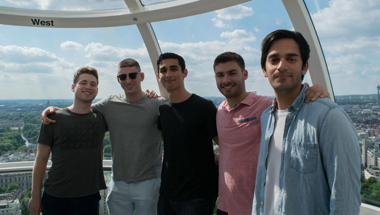 Study abroad students including UCEAP students smiling for the camera on the London Eye in London, England. 