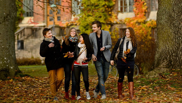 Students smiling at Lund University in Lund, Sweden. 