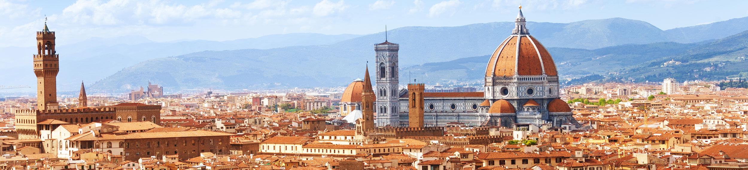 Florence cityscape with a view of Palazzo Vecchio, Cathedral of Santa Maria de Fiore, and Arno River.