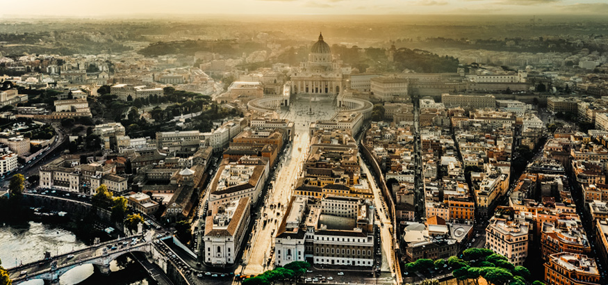 A daytime aerial view of Rome, Italy.