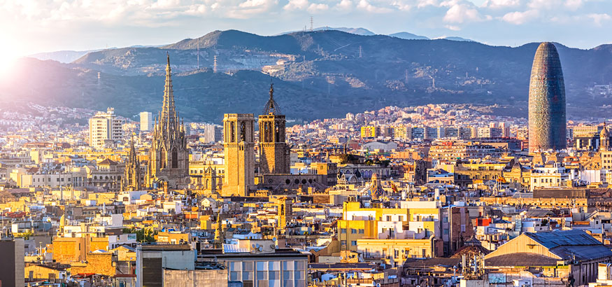 Barcelona skyline with a view of Cathedral of Barcelona and Torre Agbar in the distance in Barcelona, Spain.