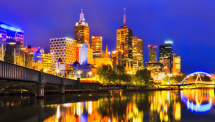 Illuminated Melbourne skyline reflected in the Yarra River