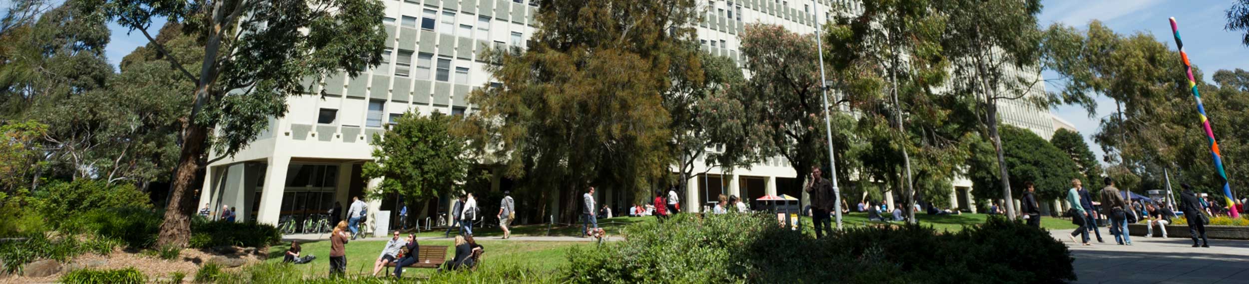 multistory building in park setting at Monash University Clayton campus