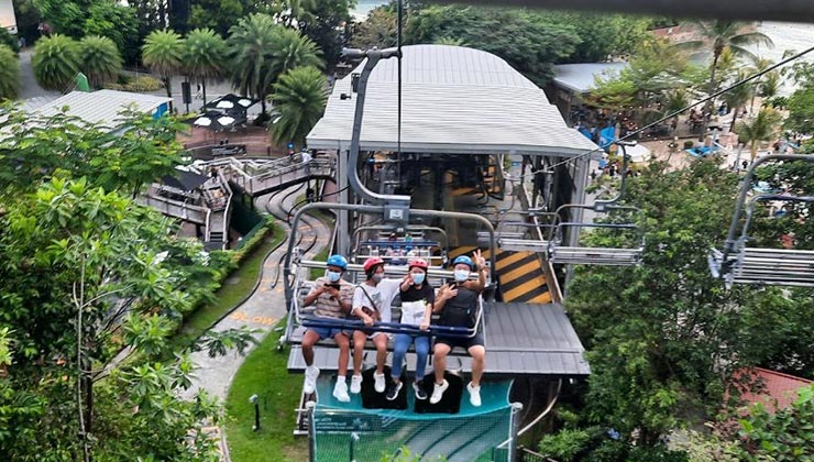 Students riding a luge lift in Sentosa Island, Singapore.