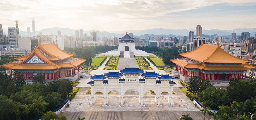 aerial sunrise view from drone of Chiang Kai-Shek Memorial Hall with taipei city