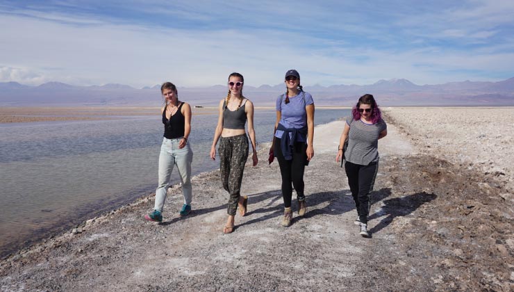 Students walk on the Salar de Atacama salt flat.