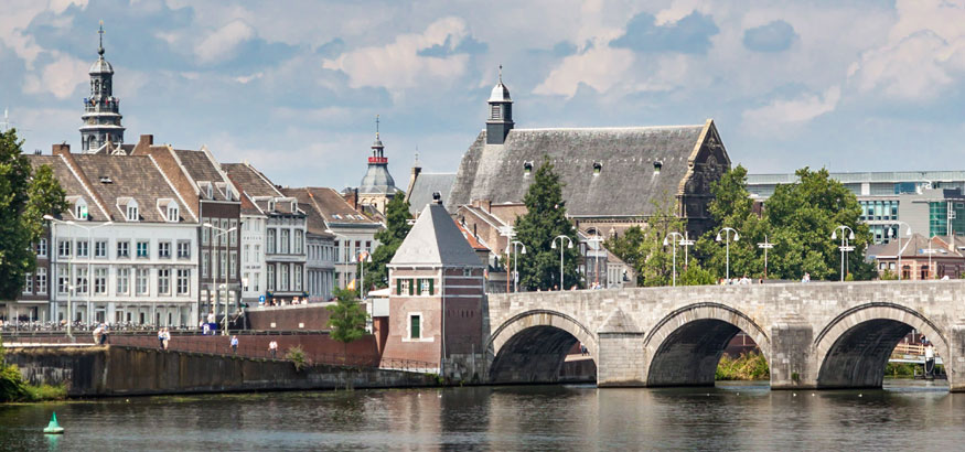 St. Servatius Bridge and buildings near the river Meuse in Maastricht, Netherlands