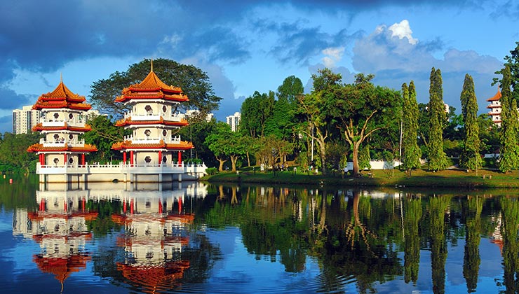 Famous twin pagodas on the banks of the Jurong Lake at the Chinese Garden in Singapore. 