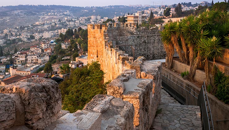 he Fortified old City Walls in Jerusalem, Israel taken at sunrise