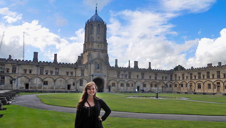 A student posing on the University of Oxford campus in Oxford England. 