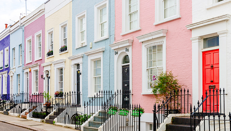 A row of colorful townhouses in London, UK